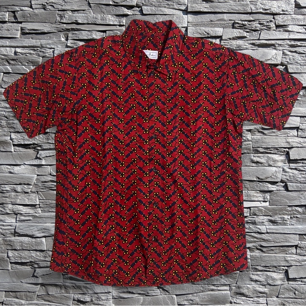 Red/Blue/Yellow Button Up (can’t read brand) Size Not Listed